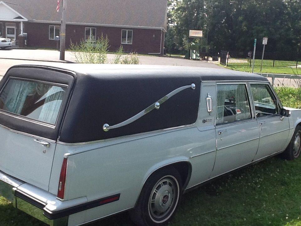 1985 Cadillac Hearse with a Cherry wood coffin